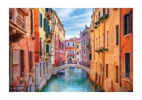 An unframed print of canal in venice italy travel photograph in pink and orange accent colour