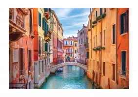An unframed print of canal in venice italy travel photograph in pink and orange accent colour
