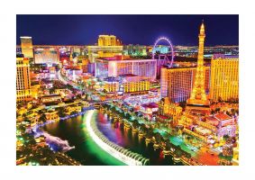 An unframed print of las vegas boulevard at night travel photograph in purple and yellow accent colour