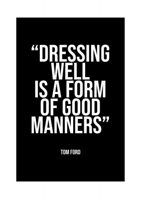 An unframed print of dressing well is a form of good manners quote in typography in black and white accent colour