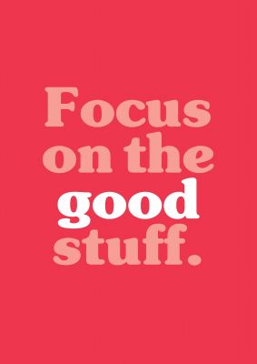 An unframed print of focus on the good stuff quote in typography in red and white accent colour