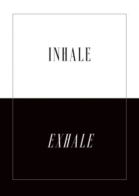 An unframed print of inhale exhale graphical in typography in black and white accent colour