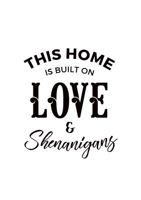 An unframed print of this house is built on love quote in typography in white and black accent colour