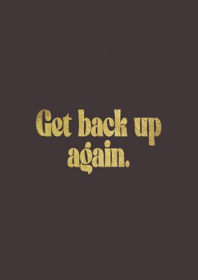 An unframed print of gold inspirational get back up quote in typography in brown and black accent colour