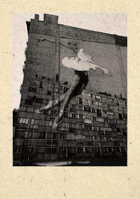 An unframed print of dancing large mosiac on side of building graphical photograph in monochrome