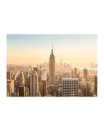 An unframed print of empire state building new york manhattan travel photograph in beige and blue accent colour