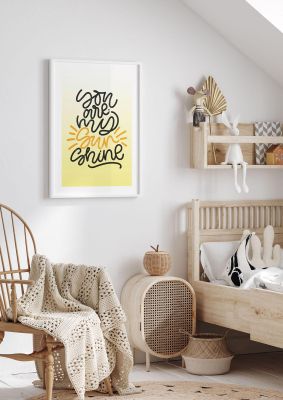 An unframed print of you are my sunshine quote in typography in yellow and black accent colour