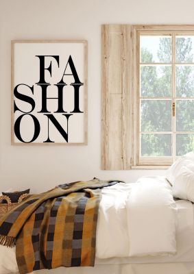 An unframed print of fashion fashion in typography in white and black accent colour