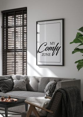 An unframed print of my comfy zone quote in typography in white and black accent colour