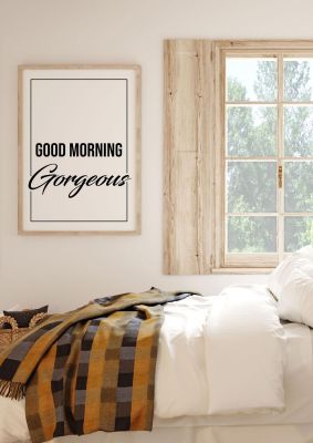 An unframed print of good morning gorgeous quote in typography in white and black accent colour
