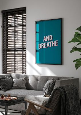 An unframed print of and breathe quote in typography in green and white accent colour