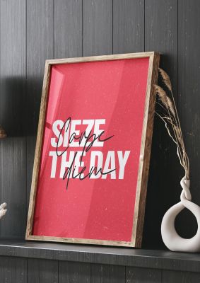 An unframed print of carpe diem quote in typography in pink and white accent colour
