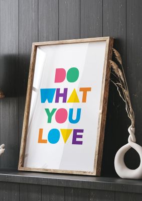 An unframed print of do what you want quote in typography in white and multicolour accent colour