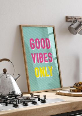 An unframed print of good vibes only funny slogans in typography in green and pink accent colour