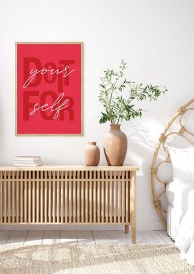 An unframed print of do it for yourself quote in typography in red and white accent colour