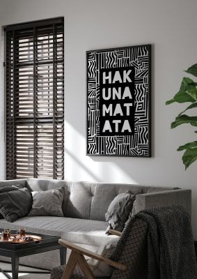 An unframed print of hakuna matata quote in typography in black and white accent colour