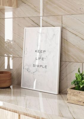 An unframed print of keep life simple graphical in typography in grey and black accent colour