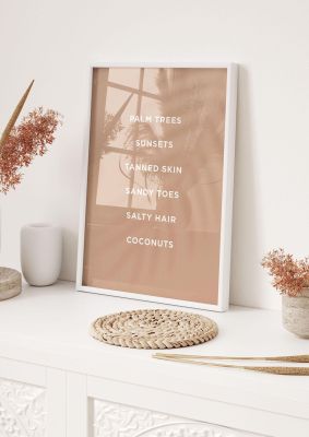 An unframed print of palm trees sunsets tanned skin quote in typography in beige and white accent colour