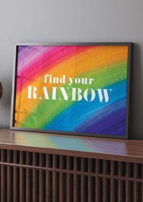 An unframed print of find your rainbow quote in typography in multicolour and white accent colour
