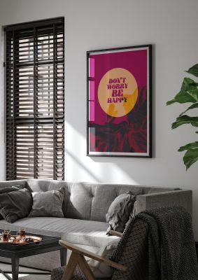 An unframed print of don't worry be happy lyric tropical quote graphic in orange and pink accent colour