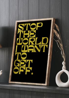 An unframed print of stop the world lyric quote in typography in black and yellow accent colour