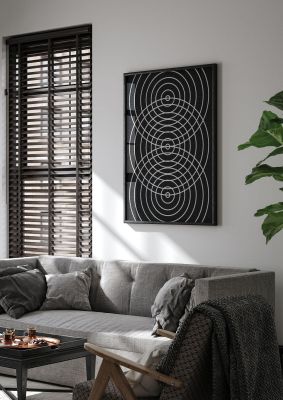 An unframed print of abstract black line disc graphical in black and white accent colour