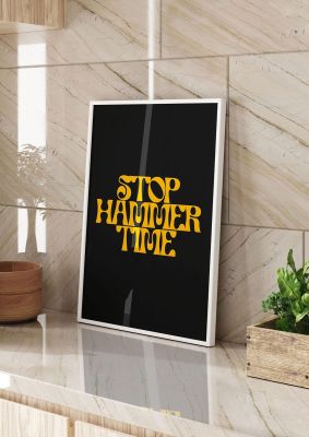 An unframed print of stop hammer time lyric quote in typography in black and yellow accent colour