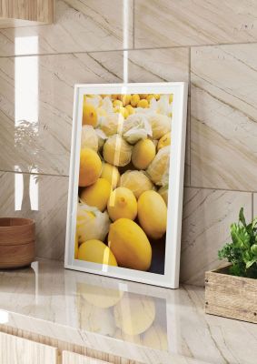 An unframed print of lemons botanical photograph in yellow and white accent colour