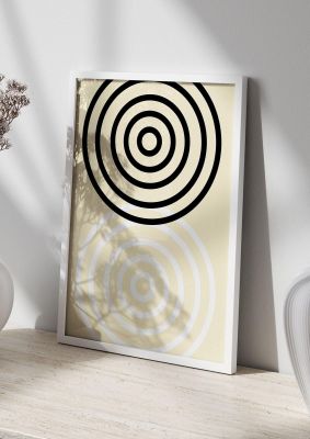 An unframed print of abstract circle clean graphical in beige and black accent colour