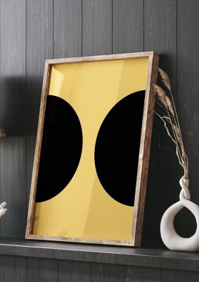 An unframed print of yellow black disc abstract one retro in orange and black accent colour