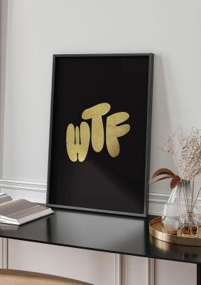 An unframed print of wtf gold graphical in typography in black and gold accent colour