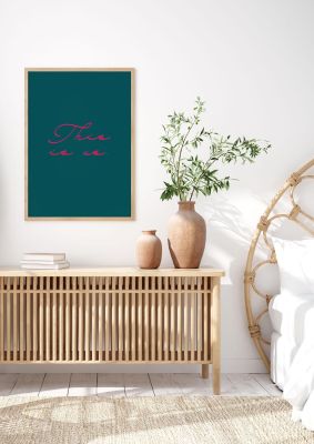 An unframed print of this is us script handwritten quote in typography in teal and pink accent colour