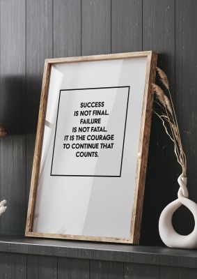 An unframed print of courage to continue square quote in typography in grey and black accent colour