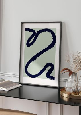 An unframed print of abstract paint swirl graphical in green and black accent colour