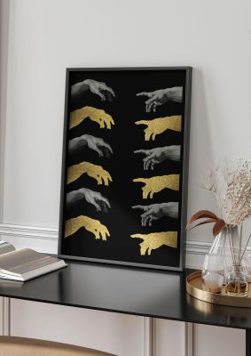 An unframed print of creation of adam gold black famous paintings graphic in black and gold accent colour