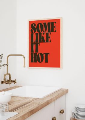 An unframed print of some like it hot movie quote in typography in red and black accent colour