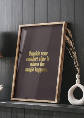 An unframed print of gold inspirational comfort zone magic quote in typography in brown and black accent colour
