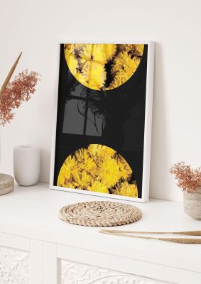 An unframed print of yellow double disc one botanical photograph in black and yellow accent colour