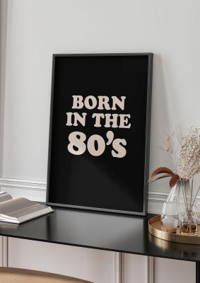 An unframed print of born in the 80's graphical in typography in black and white accent colour