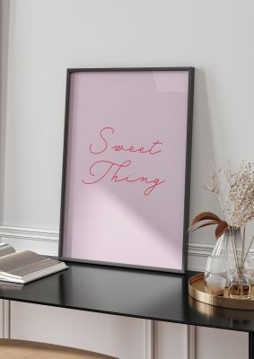 An unframed print of sweet thing minimalistic script graphical in pink and red accent colour