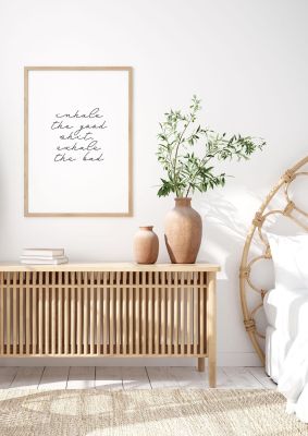 An unframed print of inhale exhale inspirational script quote in typography in white and black accent colour
