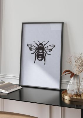 An unframed print of bee illustration in grey and black accent colour