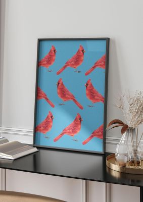 An unframed print of blue pink bird pattern illustration in blue and pink accent colour