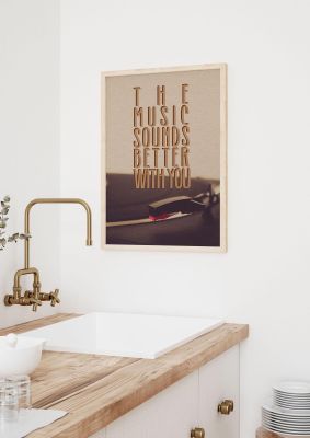 An unframed print of the music sounds better with you music in typography in beige and black accent colour