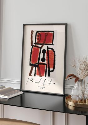 An unframed print of paul klee locksmith 1940 a famous paintings illustration in red and beige accent colour