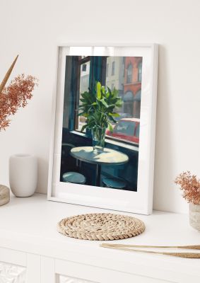 Plant on Cafe Table Against City Backdrop