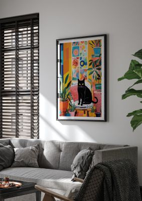 Black cat in a bright and colourful botanical room